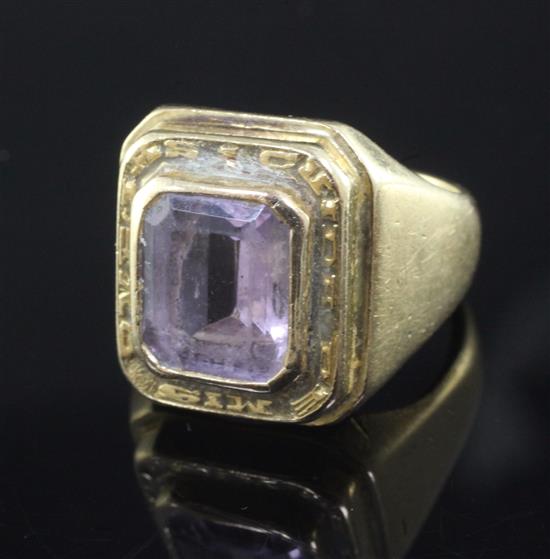 A 1970s high carat gold and amethyst? set Bishops ring, size T/U.